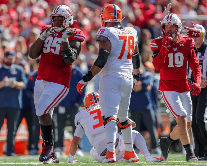 Wisconsin nose tackle Keeanu Benton celebrates a sack against Illinois.